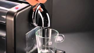 Nespresso Essenza How To  Activate the Pump System [upl. by Ardnasela]