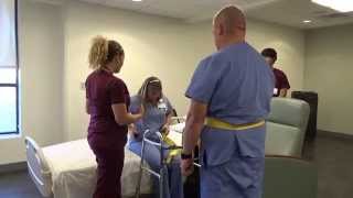 Physical Therapy Transfer Training  How To Transfer From Wheelchair To Bed [upl. by Anirol465]